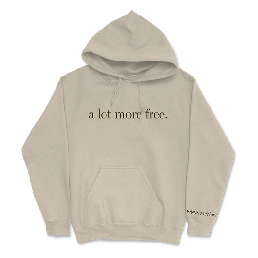 Beige hoodie with "a lot more free." text